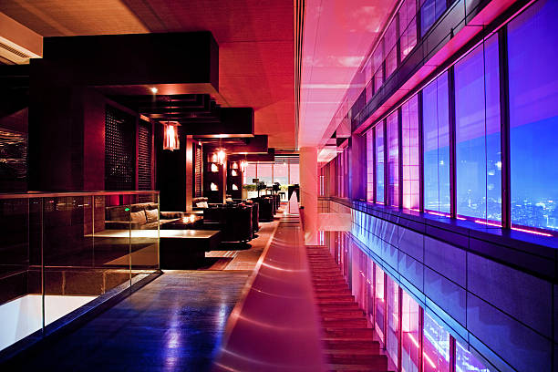 Bar Lounge in a skyscraper with strong visual experiences enhanced with lights and colors